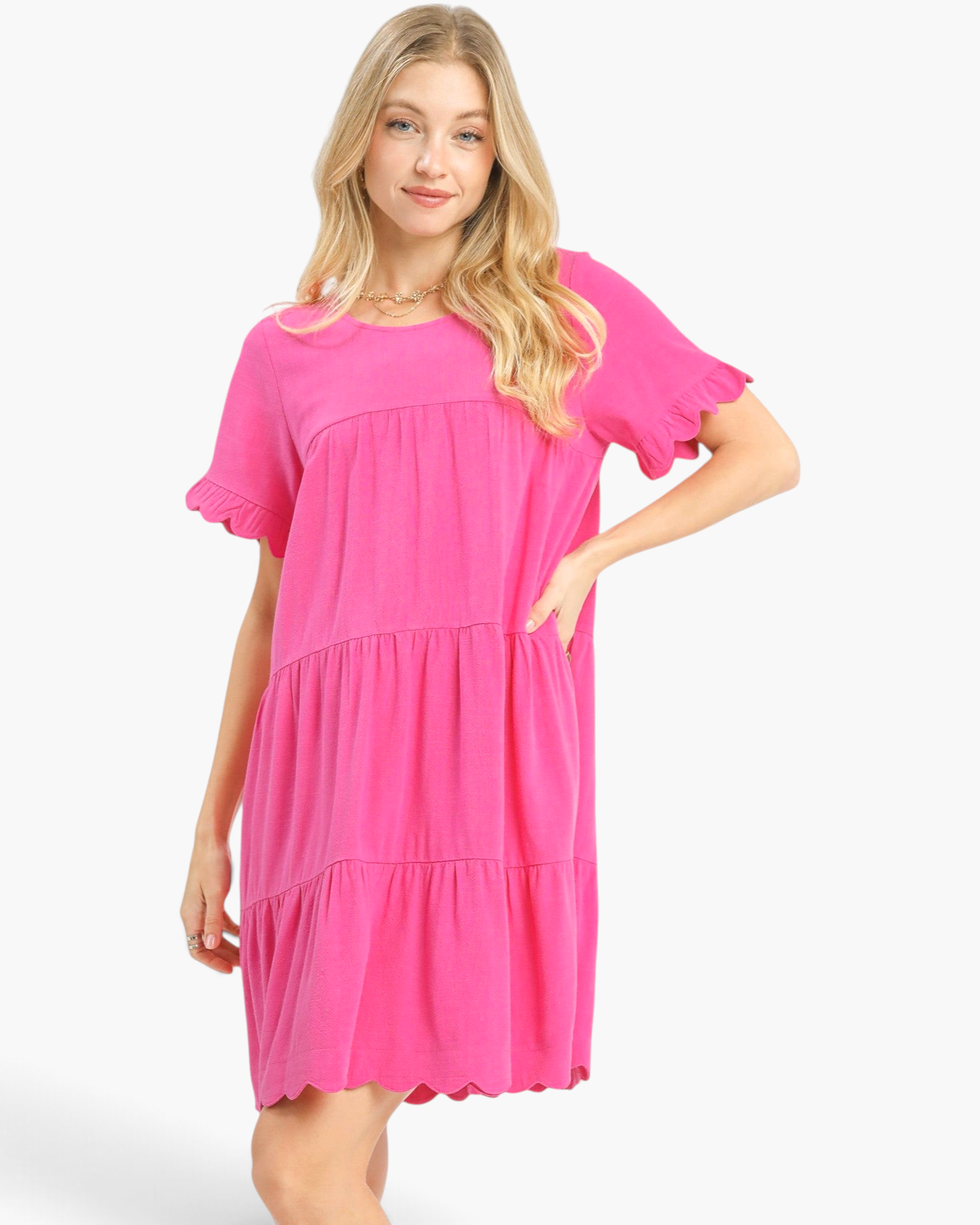 Beach Rose Co. hot pink linen blend mini dress with tiered silhouette and scalloped ruffle sleeves and hem.