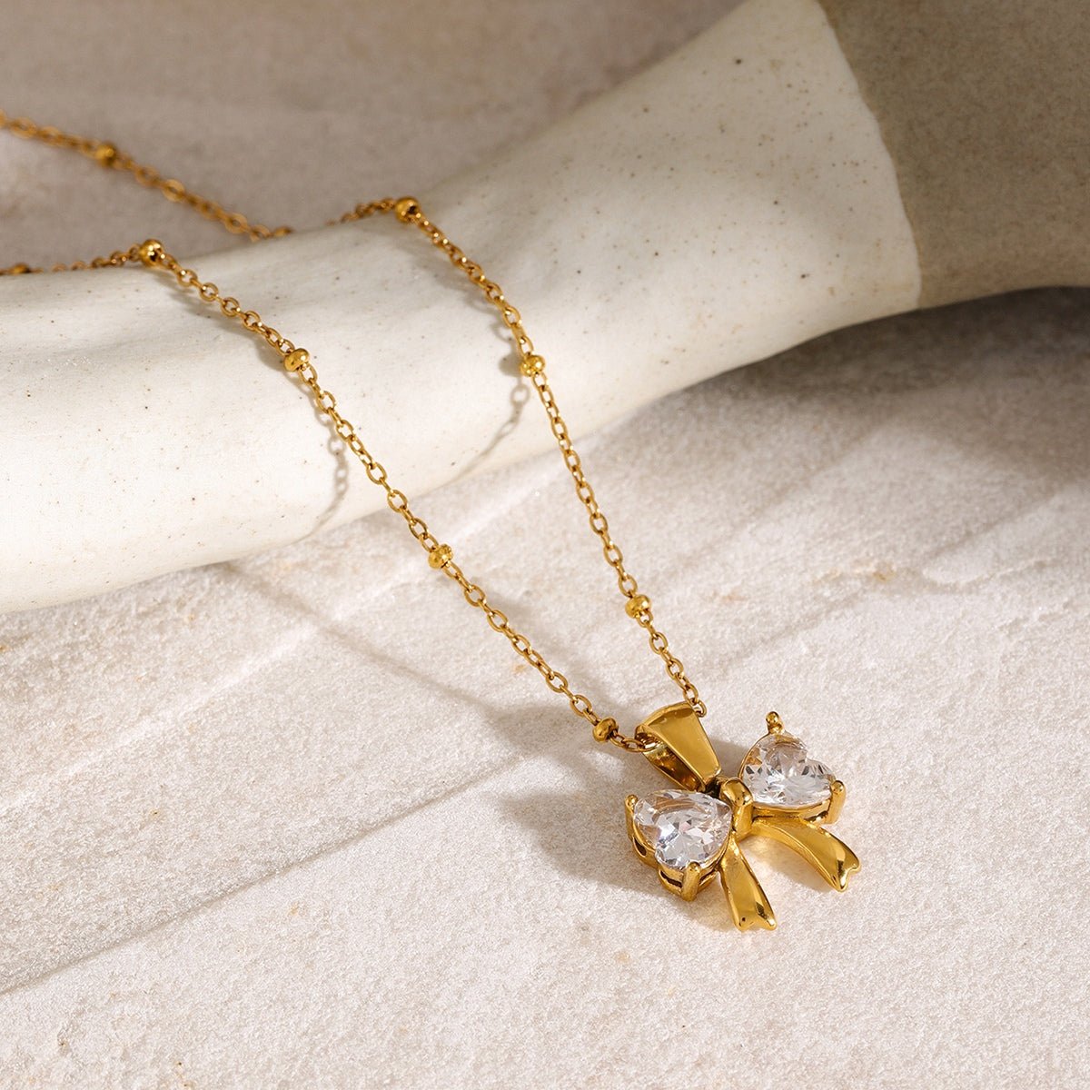 Beach Rose Co. - Inlaid Zircon Bow Pendant Necklace