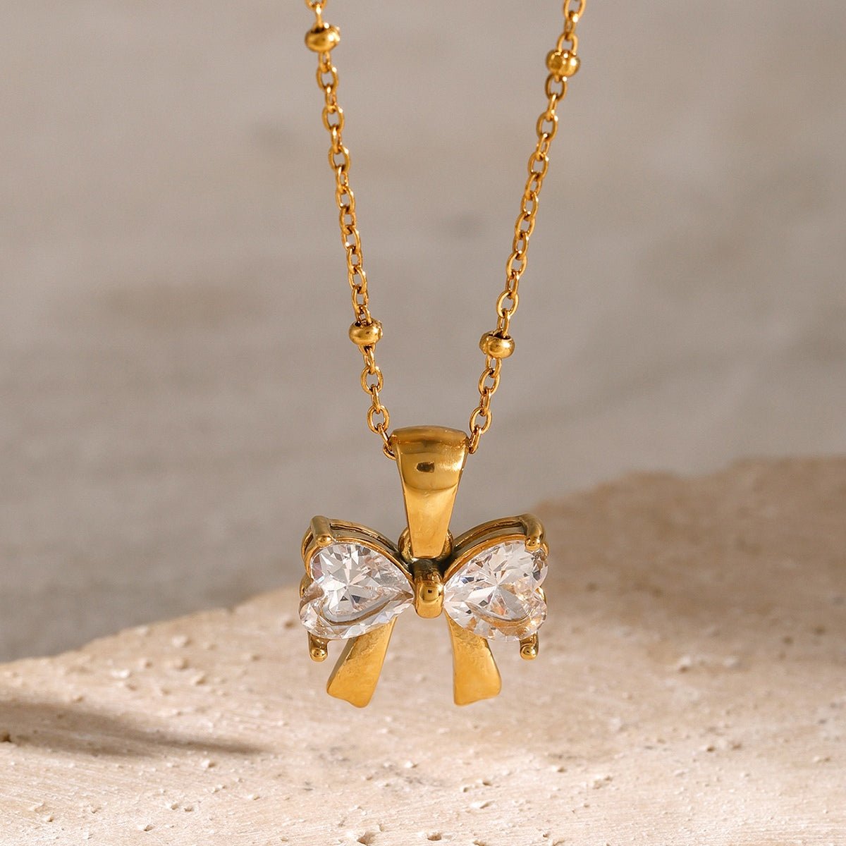 Beach Rose Co. - Inlaid Zircon Bow Pendant Necklace