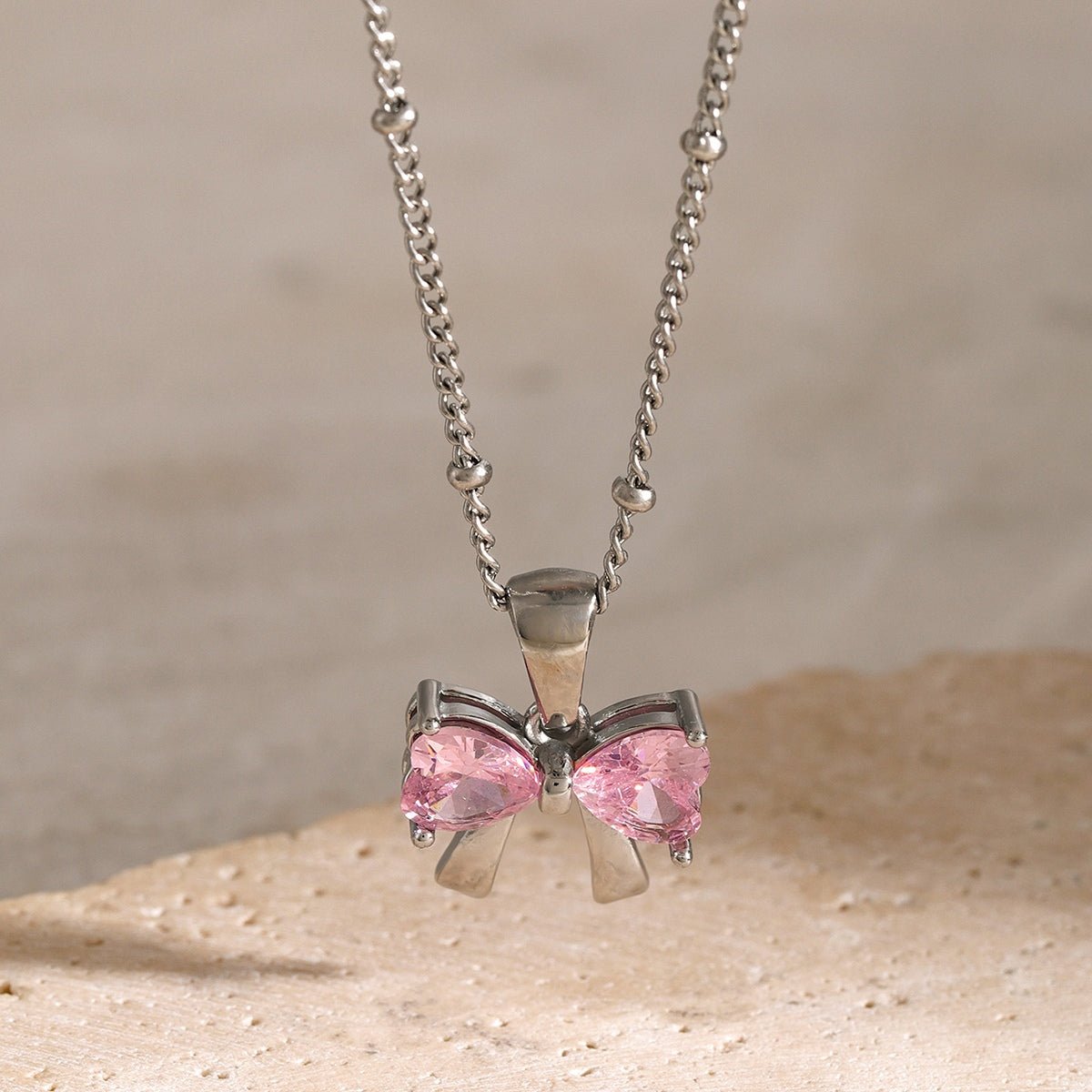 Beach Rose Co. - Inlaid Zircon Bow Pendant Necklace