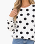 Beach Rose Co. ivory sweatshirt featuring an oversized black polka dot pattern, crew neckline, and dropped shoulders.