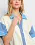 Beach Rose Co. Ivory and blue striped cotton-blend romper with collared neckline and button front.