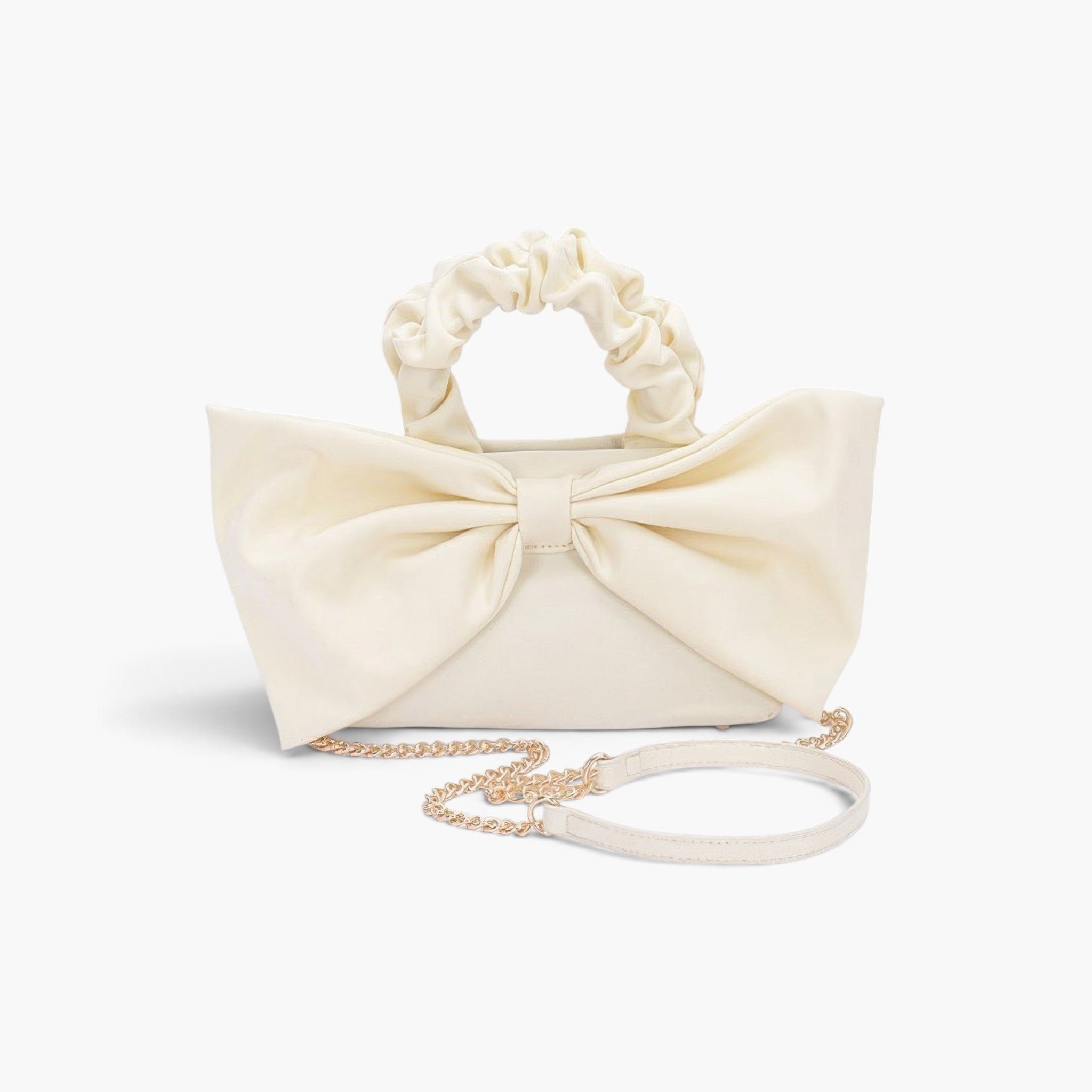 Beach Rose Co. ivory nylon clutch featuring a large front bow, ruched top handle, and detachable gold chain strap.