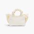 Beach Rose Co. ivory nylon clutch featuring a decorative bow front and a gathered, ruched top handle.