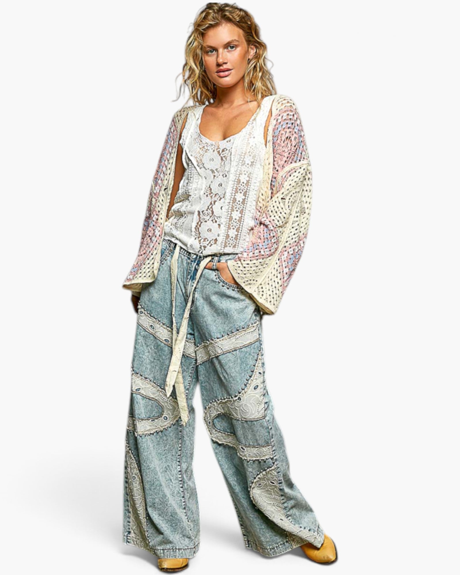 Beach Rose Co. ivory and pink crochet open-front cardigan with wide sleeves and medallion pattern on a model