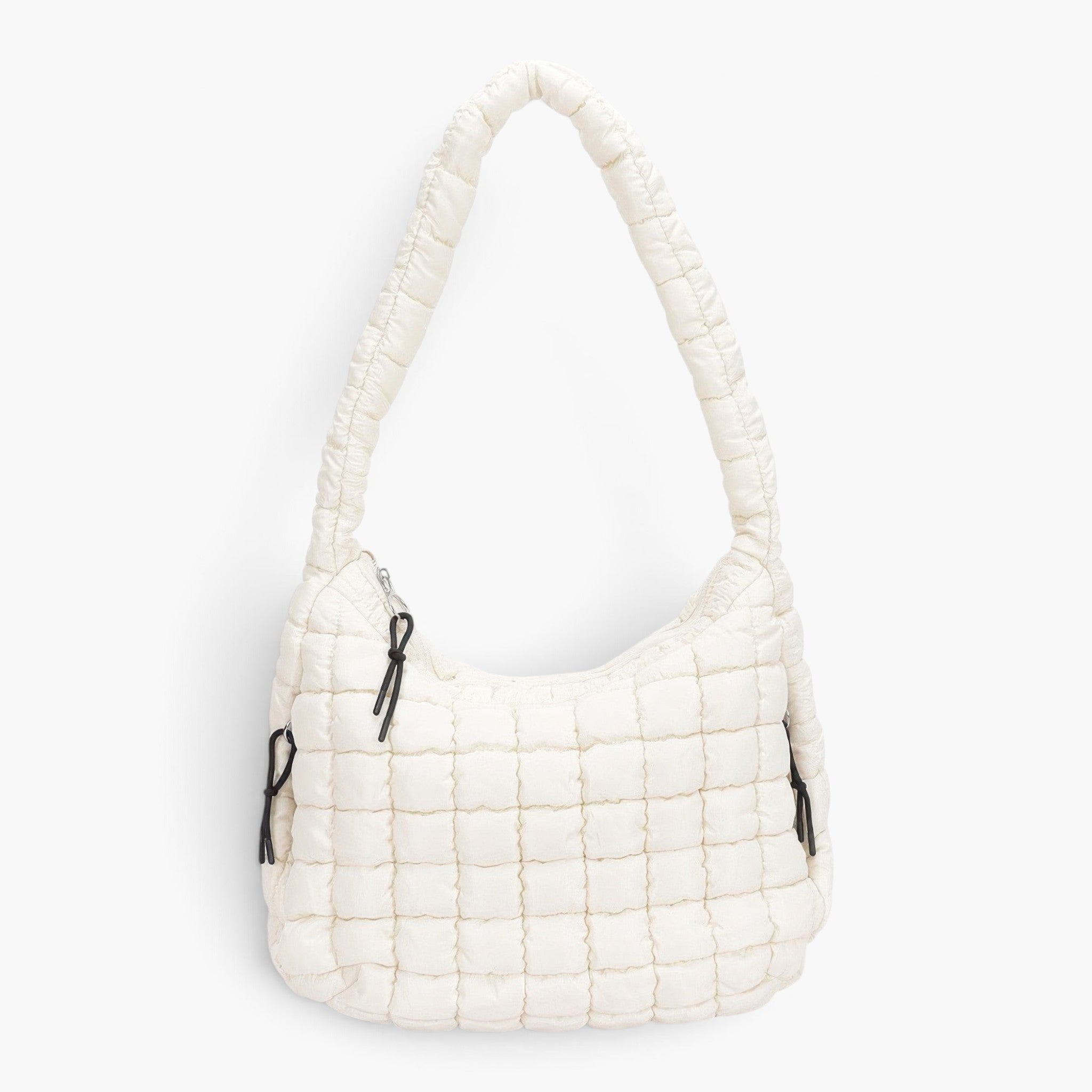 Beach Rose Co. ivory quilted nylon padded crossbody bag with a soft texture and adjustable shoulder strap