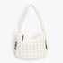 Beach Rose Co. ivory quilted nylon padded crossbody bag with a soft texture and adjustable shoulder strap
