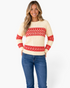 Beach Rose Co. ivory cable knit sweater with red Fair Isle patterns worn by a smiling woman with long blonde hair.