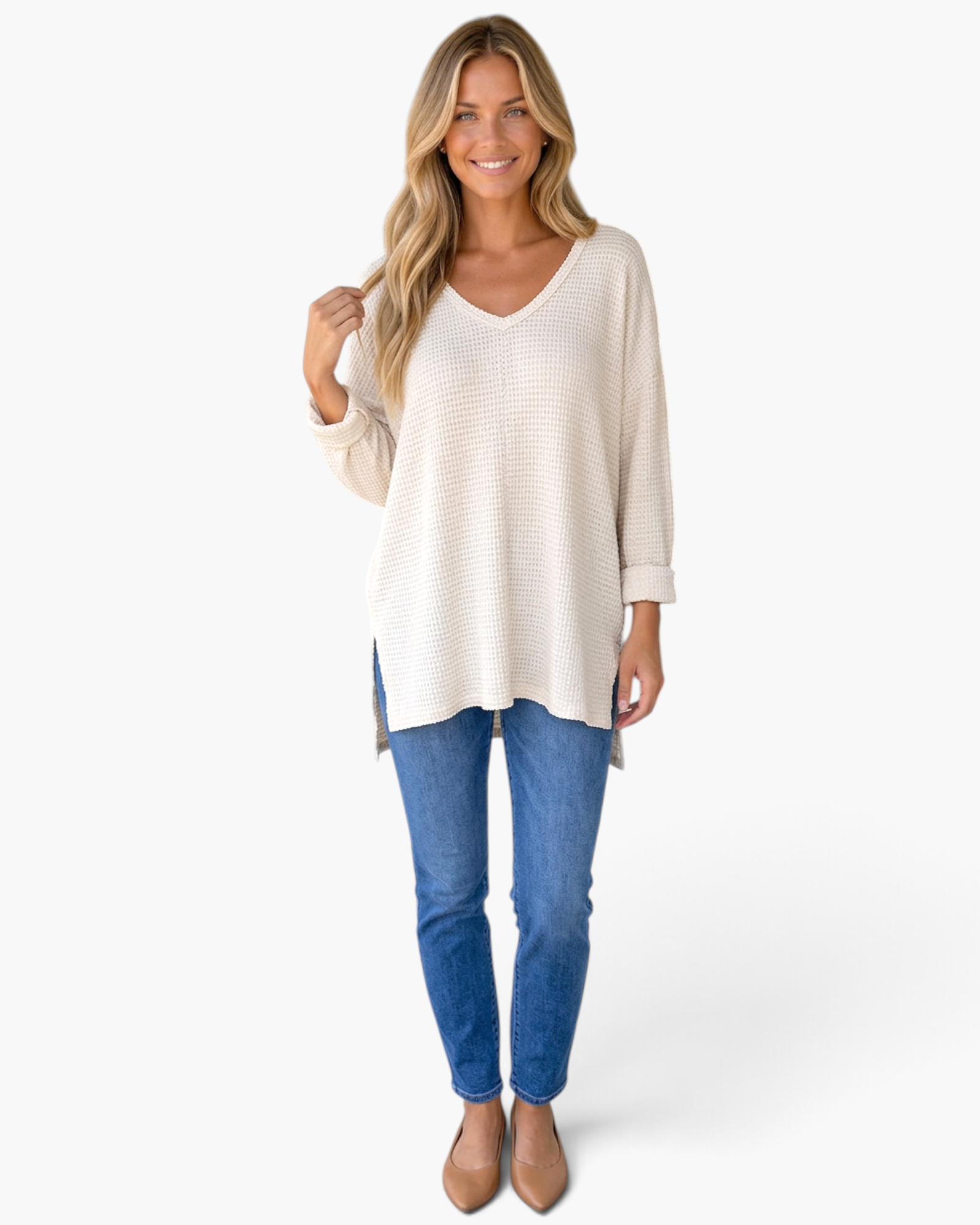Beach Rose Co. ivory waffle-knit V-neck tunic top with three-quarter sleeves worn by a smiling blonde model