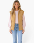 Beach Rose Co. khaki quilted puffer vest with a stand collar and zip-front, worn over a light pink sweater.