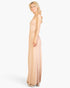 Beach Rose Co. model wearing a khaki button-front wide-leg jumpsuit in soft stretch jersey fabric, side view