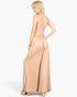 Beach Rose Co. khaki wide-leg jersey jumpsuit with spaghetti straps worn by a blonde model, back view
