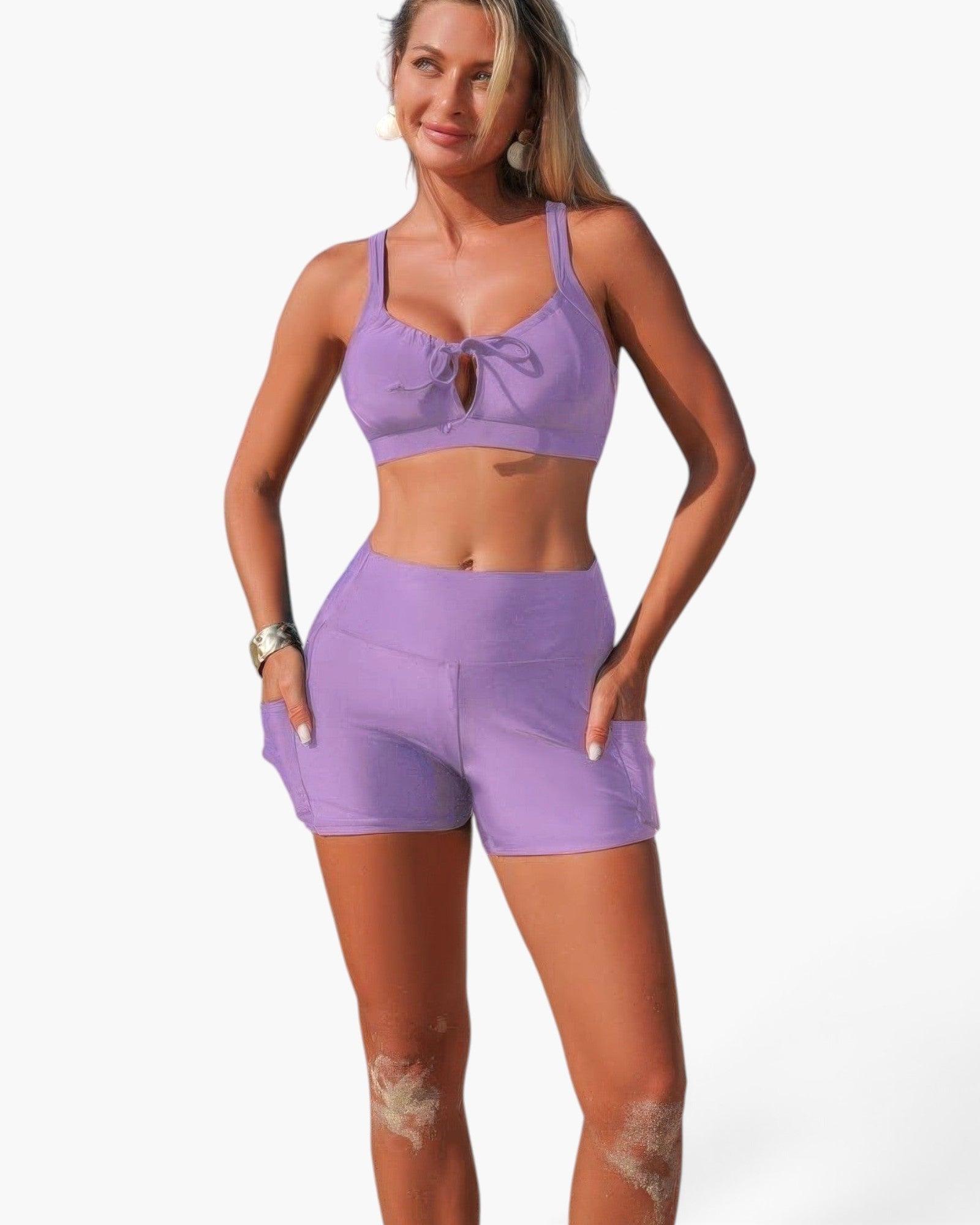 Beach Rose Co. lavender two-piece bikini with a crisscross top and tummy control shorts featuring side pockets.