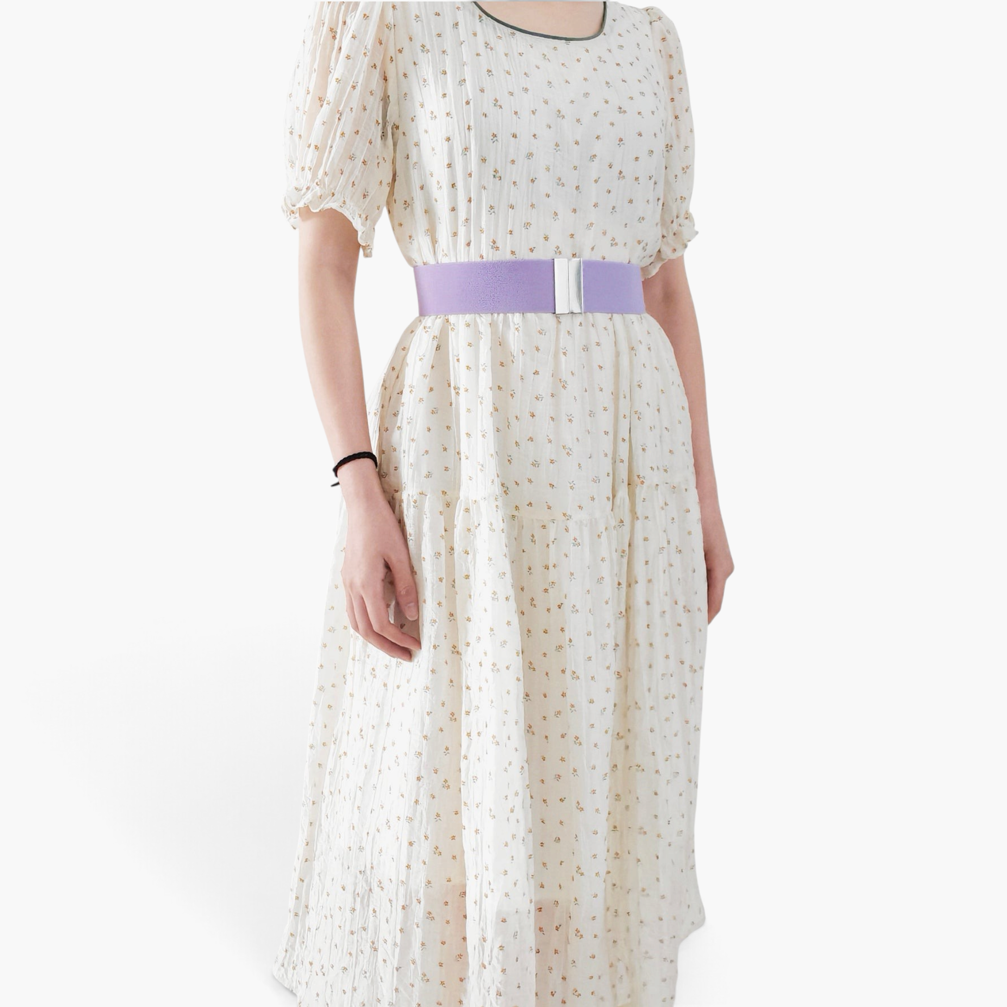 Beach Rose Co. wide lavender elastic waist belt with a rectangular alloy clasp worn over a floral midi dress