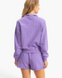 Beach Rose Co. lavender cotton half-zip pullover with dropped shoulders and banded hem, back view on a model.