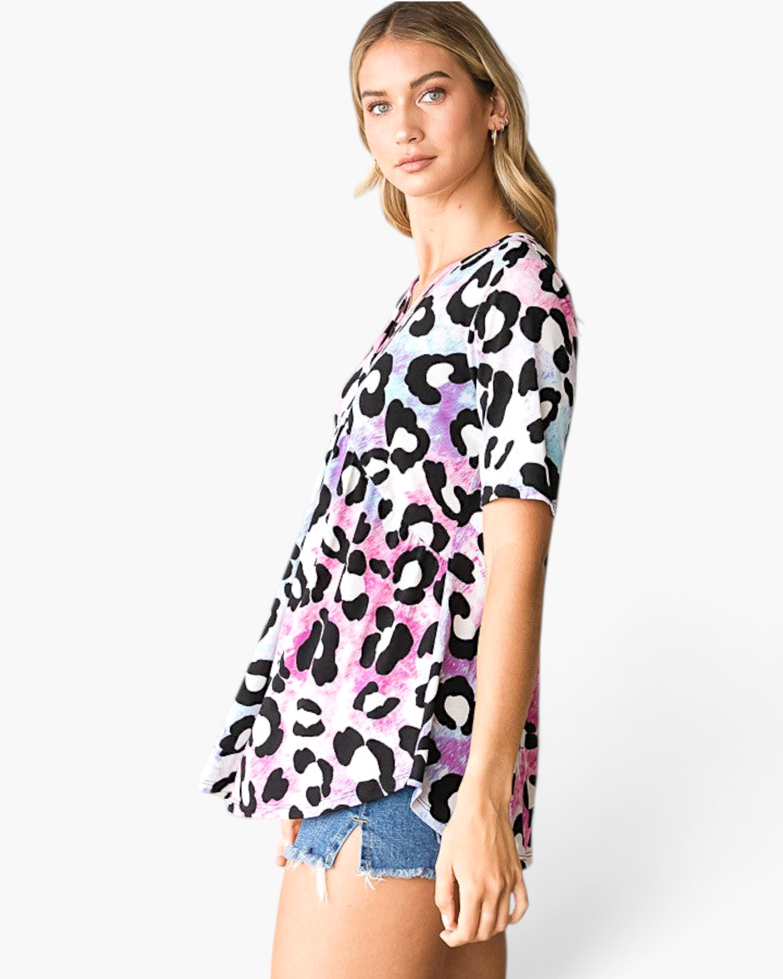Beach Rose Co. multicolor leopard print babydoll top with a crisscross V-neckline and relaxed flowy fit on a model.