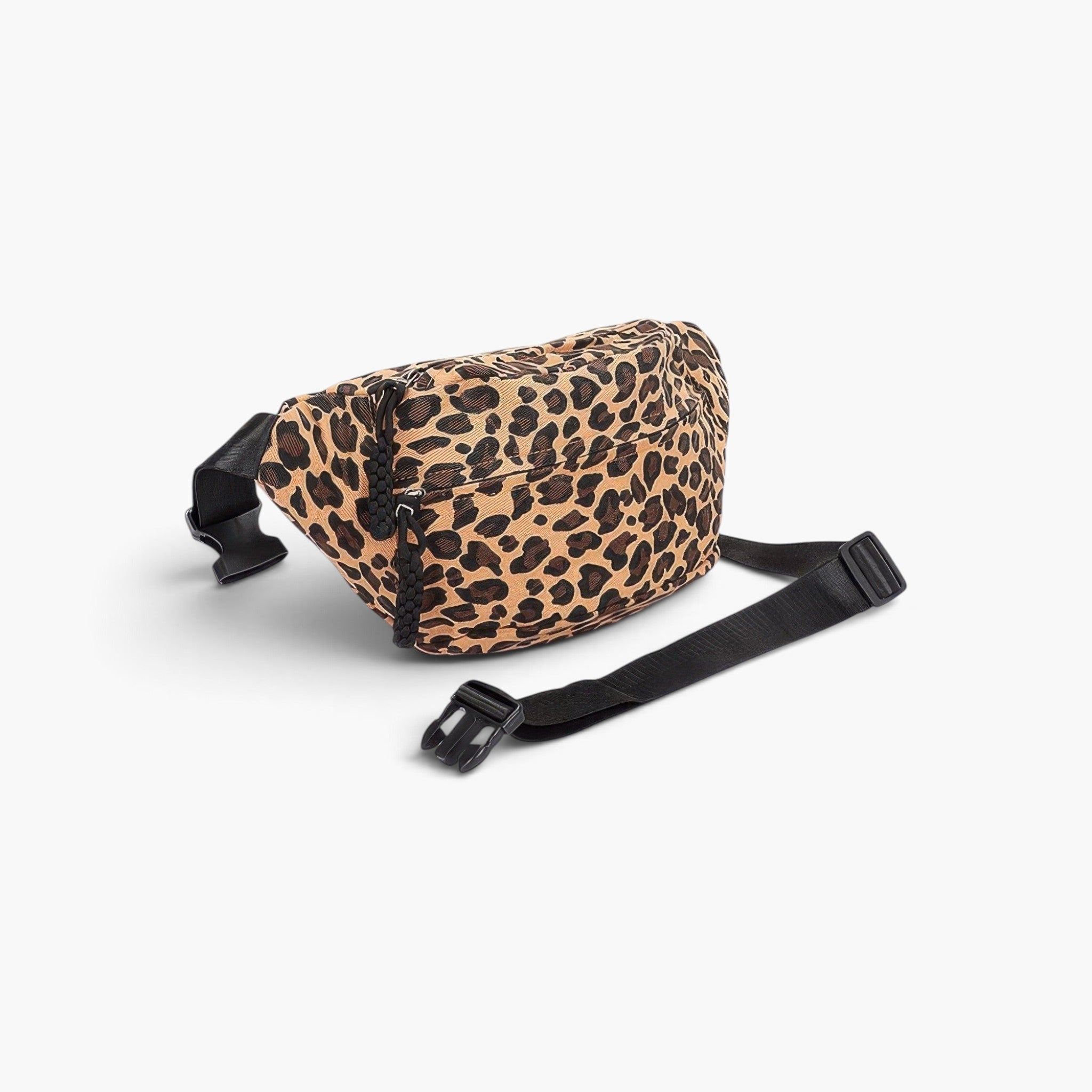 Beach Rose Co. cotton canvas crossbody bag in a bold leopard print with an adjustable black strap.