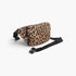 Beach Rose Co. cotton canvas crossbody bag in a bold leopard print with an adjustable black strap.