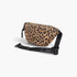 Beach Rose Co. leopard print cotton canvas crossbody bag with an adjustable black strap against a white background.