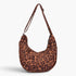 Beach Rose Co. leopard print faux suede crossbody bag with an adjustable strap and spacious double front pockets