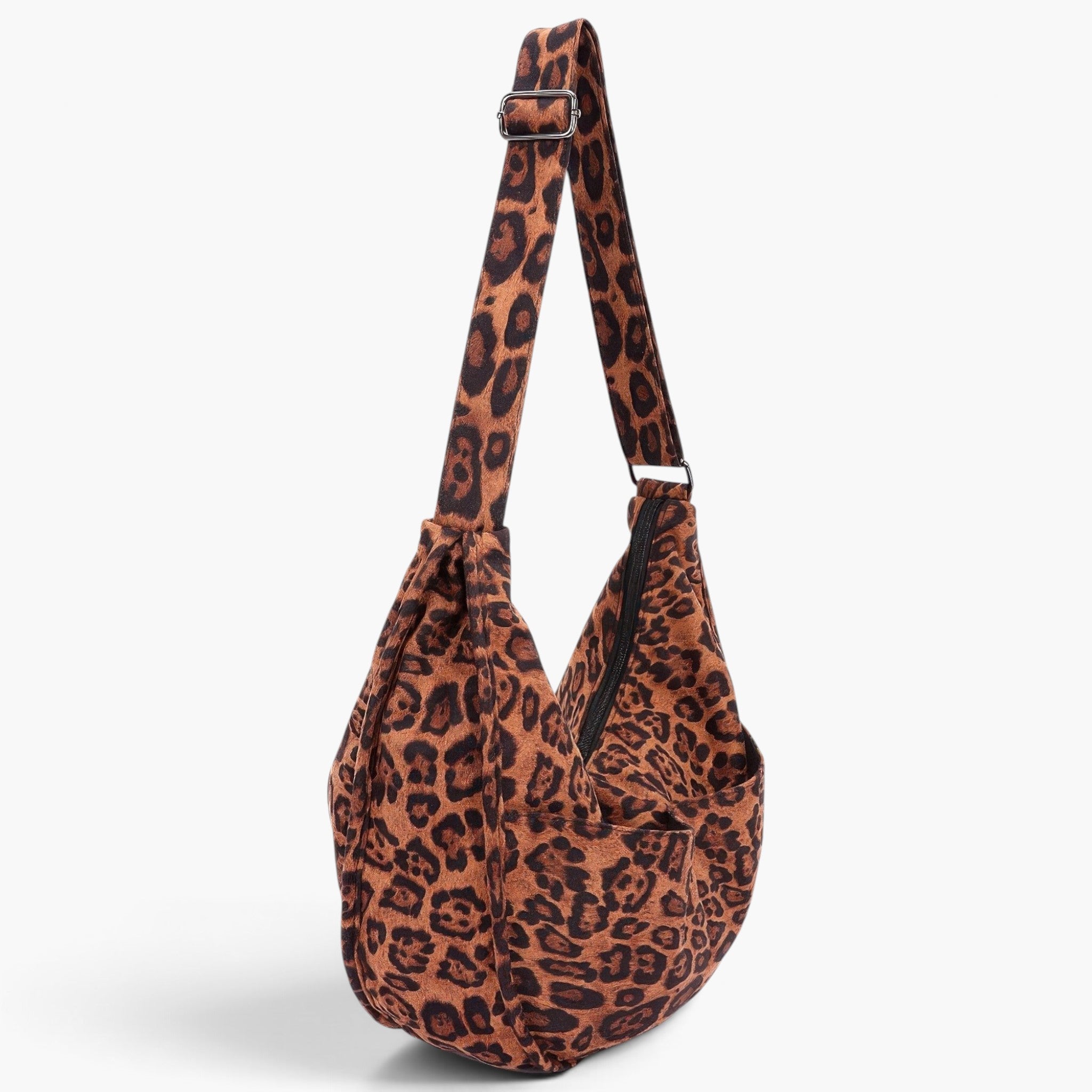 Beach Rose Co. leopard print faux suede crossbody bag with double front pockets and an adjustable shoulder strap.