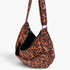 Beach Rose Co. leopard print faux suede crossbody bag with double front pockets and adjustable shoulder strap.