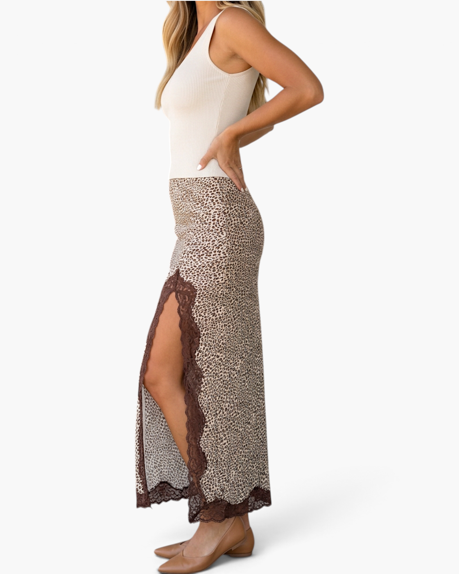 Beach Rose Co. brown and cream leopard print maxi skirt with a lace-trimmed side slit and hem on a model