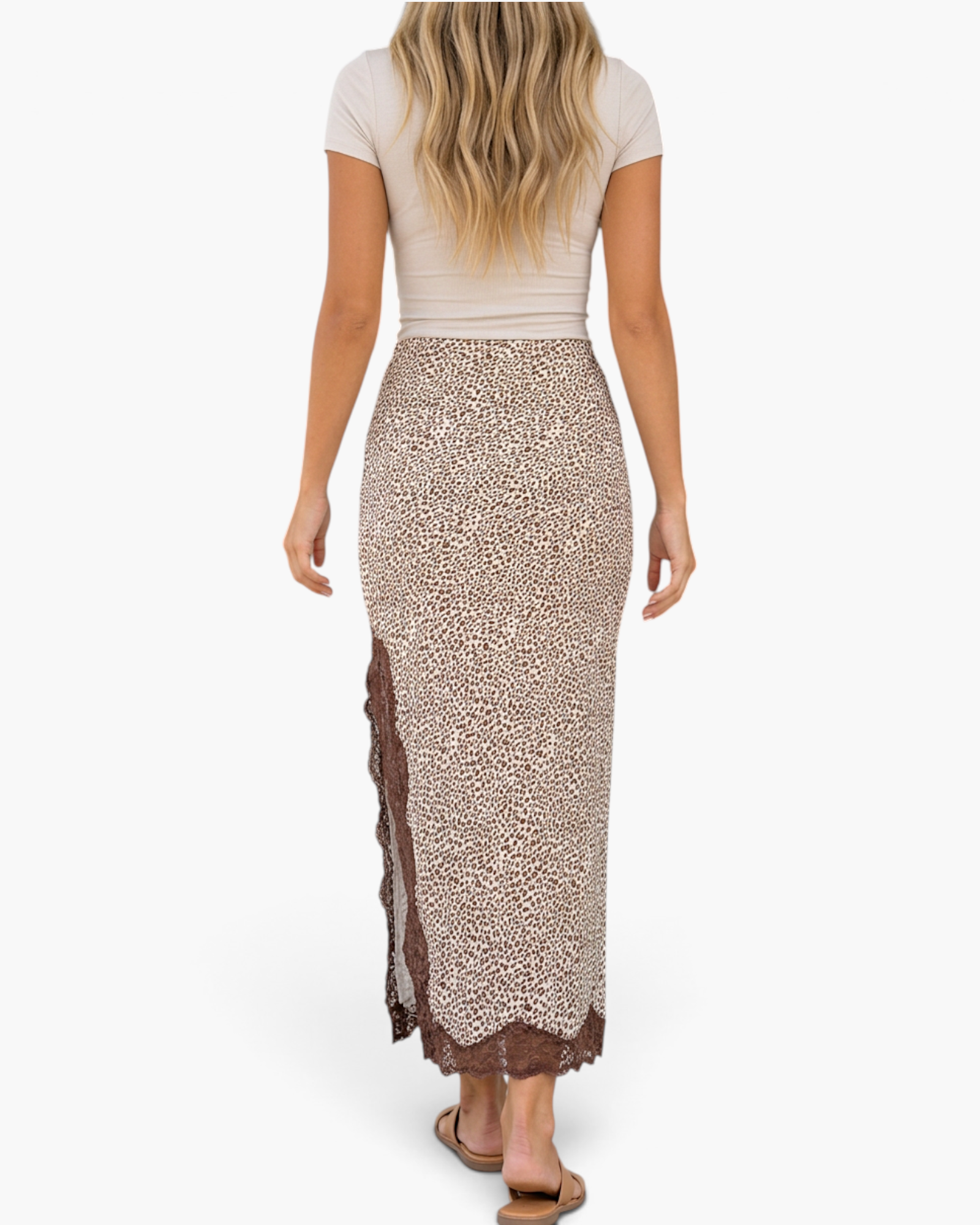 Beach Rose Co. brown and cream leopard print maxi skirt with lace-trimmed side slit and hem worn by a model