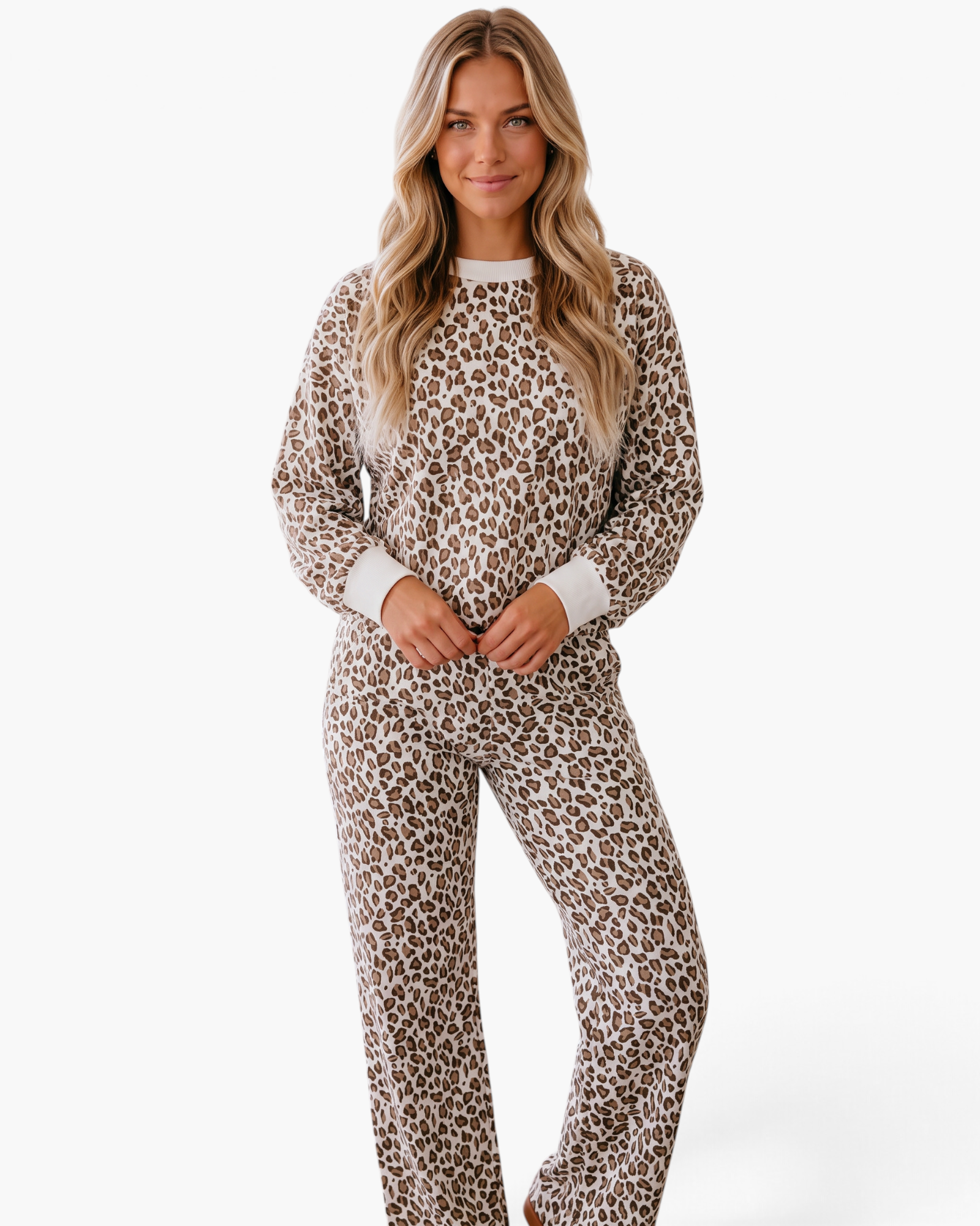 Beach Rose Co. ivory and brown leopard print lounge set with long-sleeve crewneck top and straight-leg pants on model.
