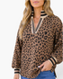 Beach Rose Co. camel and black leopard print pullover with a stand collar, V-neck, and striped ribbed trim cuffs.