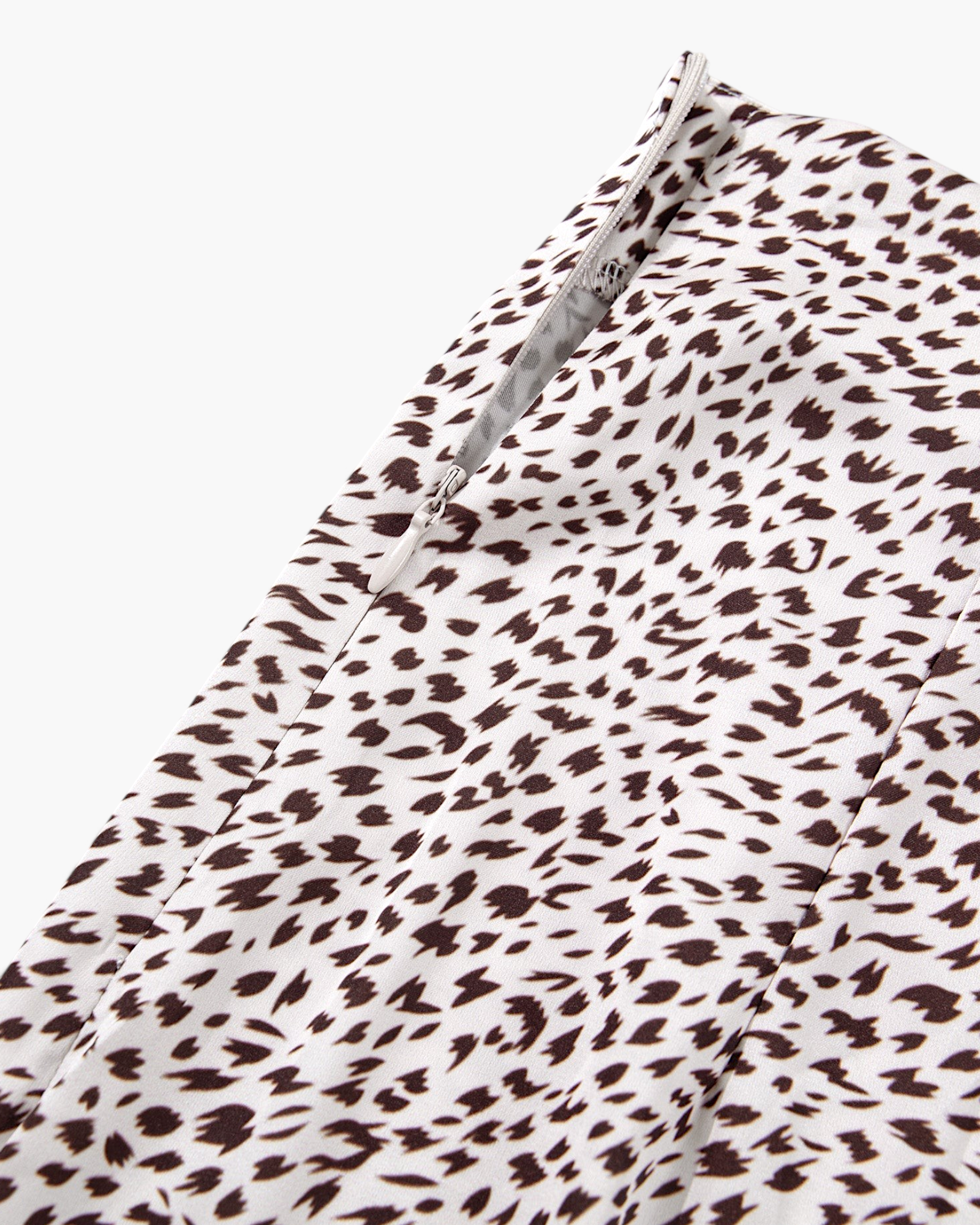 Beach Rose Co. brown and cream leopard print maxi skirt featuring a side zipper closure and delicate fabric detail.