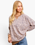 Beach Rose Co. taupe leopard print sweatshirt with brown contrast trim, drop shoulders, and a relaxed layered look.