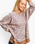 Beach Rose Co. taupe leopard print long sleeve sweatshirt with brown contrast trim and a relaxed layered-look fit.