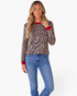 Beach Rose Co. long sleeve top featuring a tan and black leopard print with contrasting red neckline and cuffs.