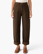 Beach Rose Co. brown leopard print wide-leg cotton pants featuring cuffed hems and a front button closure.