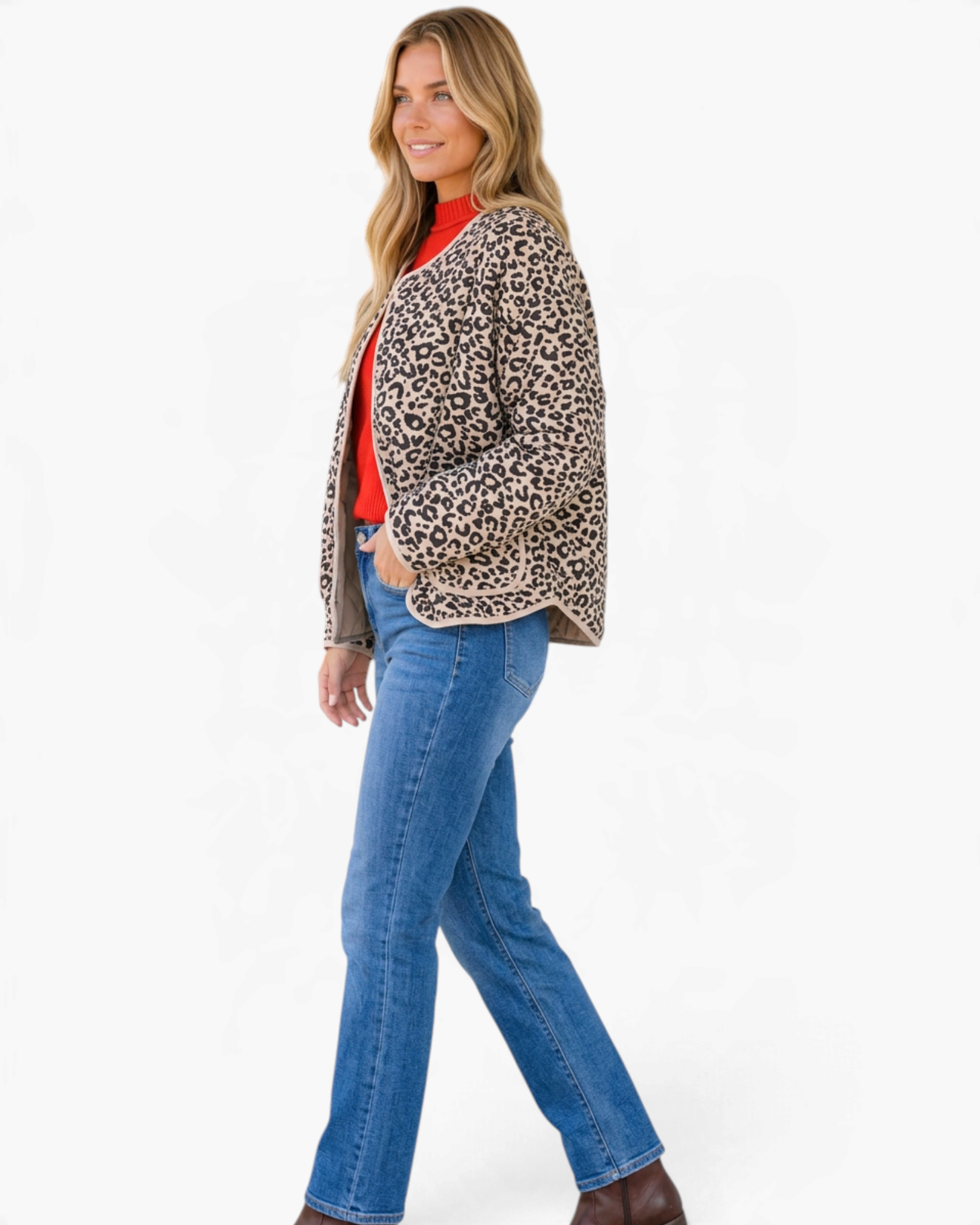 Beach Rose Co. beige and black leopard print quilted snap-front jacket worn by a model with jeans and red top