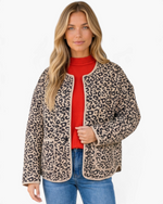 Beach Rose Co. beige and black leopard print quilted jacket with a collarless snap-front and patch pockets.