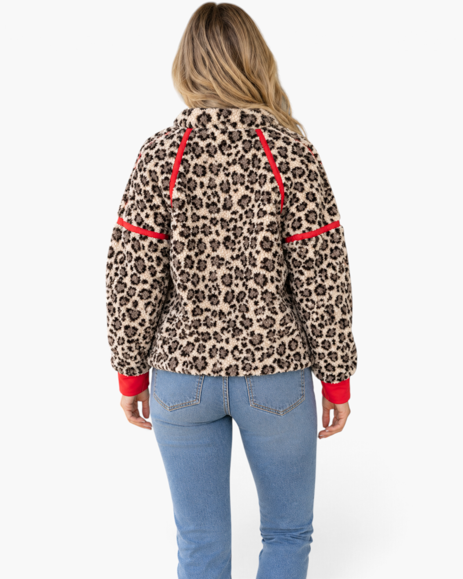 Beach Rose Co. cream leopard print sherpa pullover with red trim details, shown from the back on a blonde model.