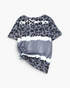 Beach Rose Co. cloudy blue and black leopard print V-neck top with ivory tie-dye bands and a side-tied hem.