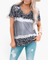 Beach Rose Co. cloudy blue leopard print V-neck top with ivory tie-dye bands worn by a blonde model with jeans.
