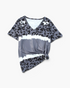 Beach Rose Co. cloudy blue leopard print V-neck top with ivory tie-dye bands and a side knot detail.