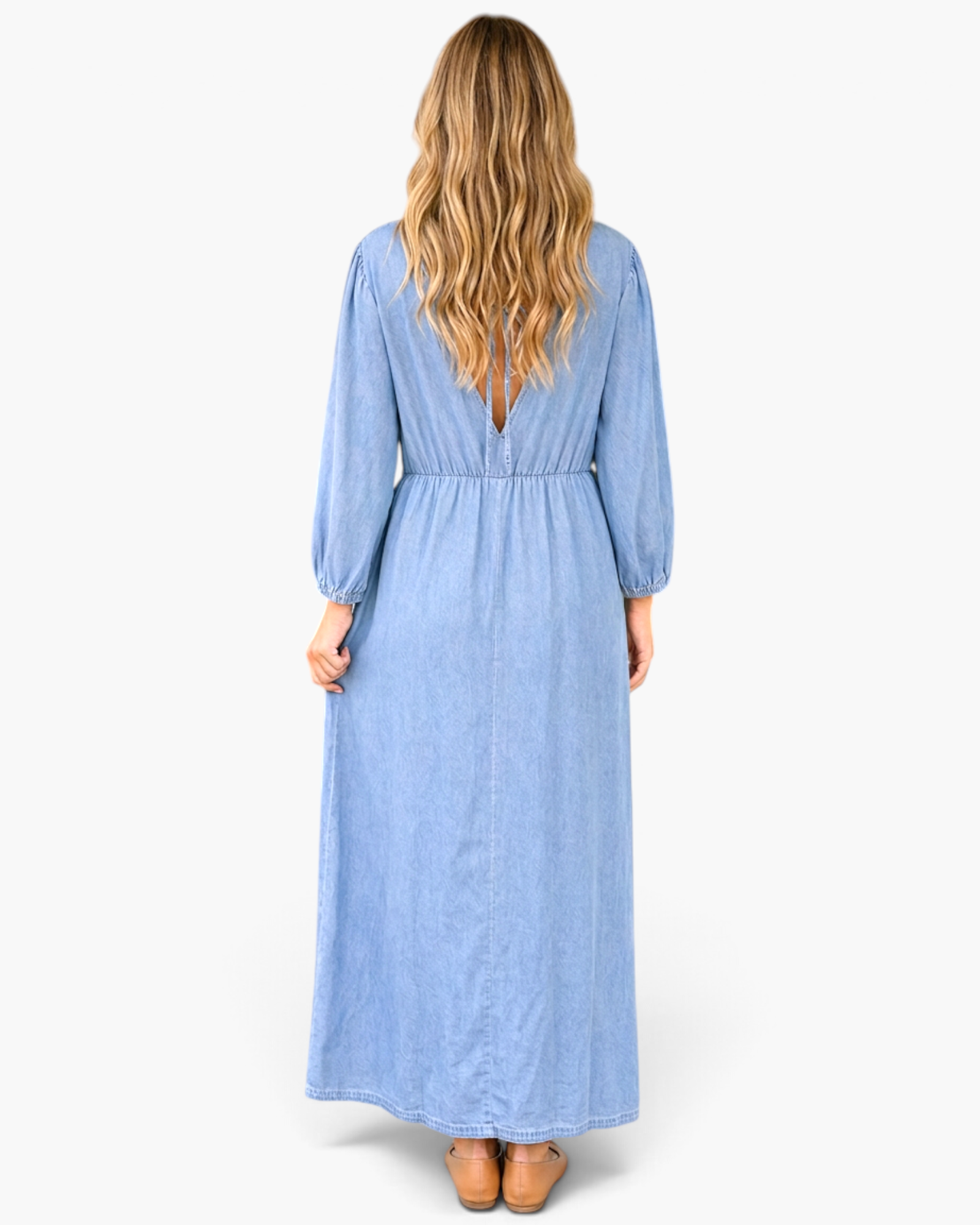 Beach Rose Co. light blue cotton maxi dress featuring three-quarter puff sleeves and a deep V-back with tie detail.