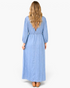 Beach Rose Co. light blue cotton maxi dress featuring three-quarter puff sleeves and a deep V-back with tie detail.