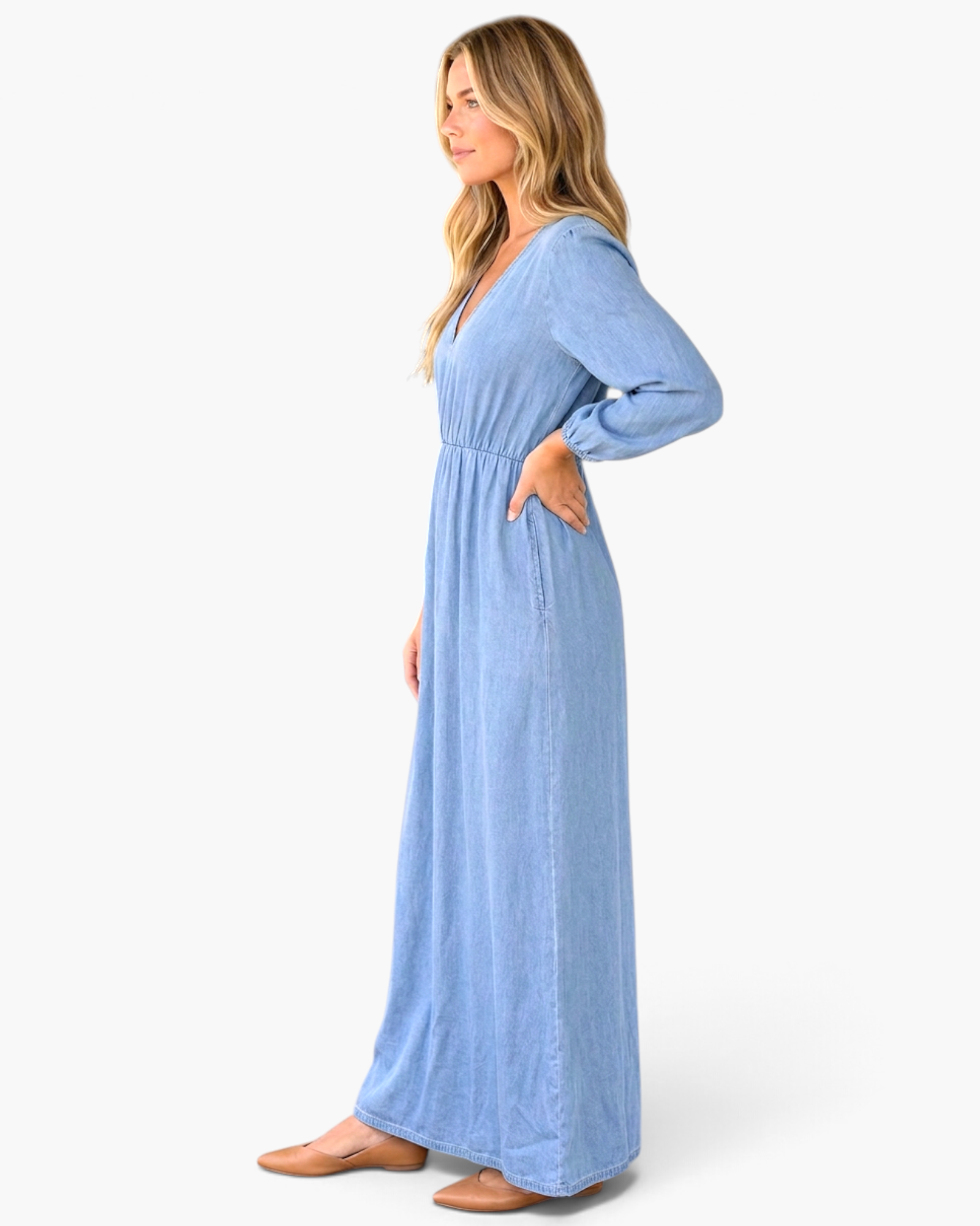 Beach Rose Co. light blue cotton maxi dress with puff sleeves and gathered waist, shown from a side profile view.
