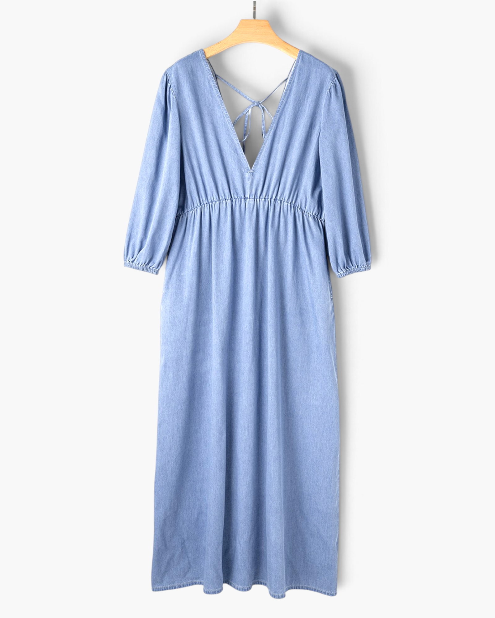 Beach Rose Co. light blue cotton maxi dress with puff sleeves, gathered waist, and deep V-back with tie detail.