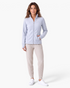 Beach Rose Co. light blue fitted polyester zip-up jacket with stand collar and contoured seams on a model.