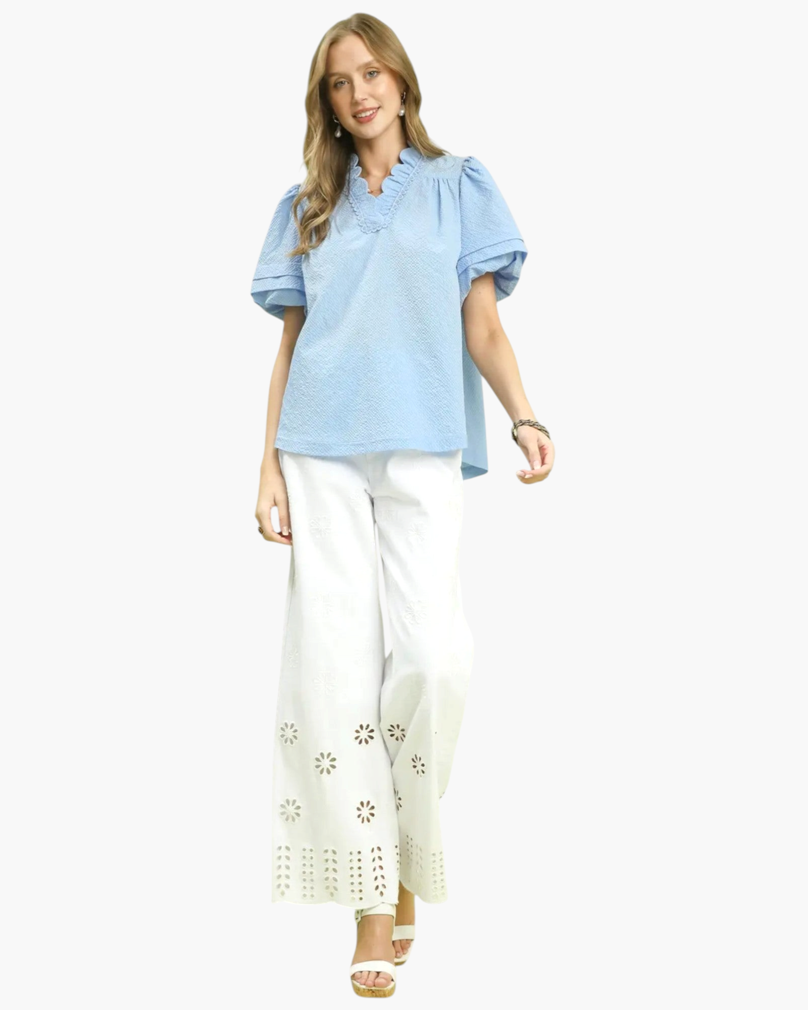 Beach Rose Co. light blue textured blouse with ruffled stand collar, puff sleeves, and loop-trimmed V-neckline.