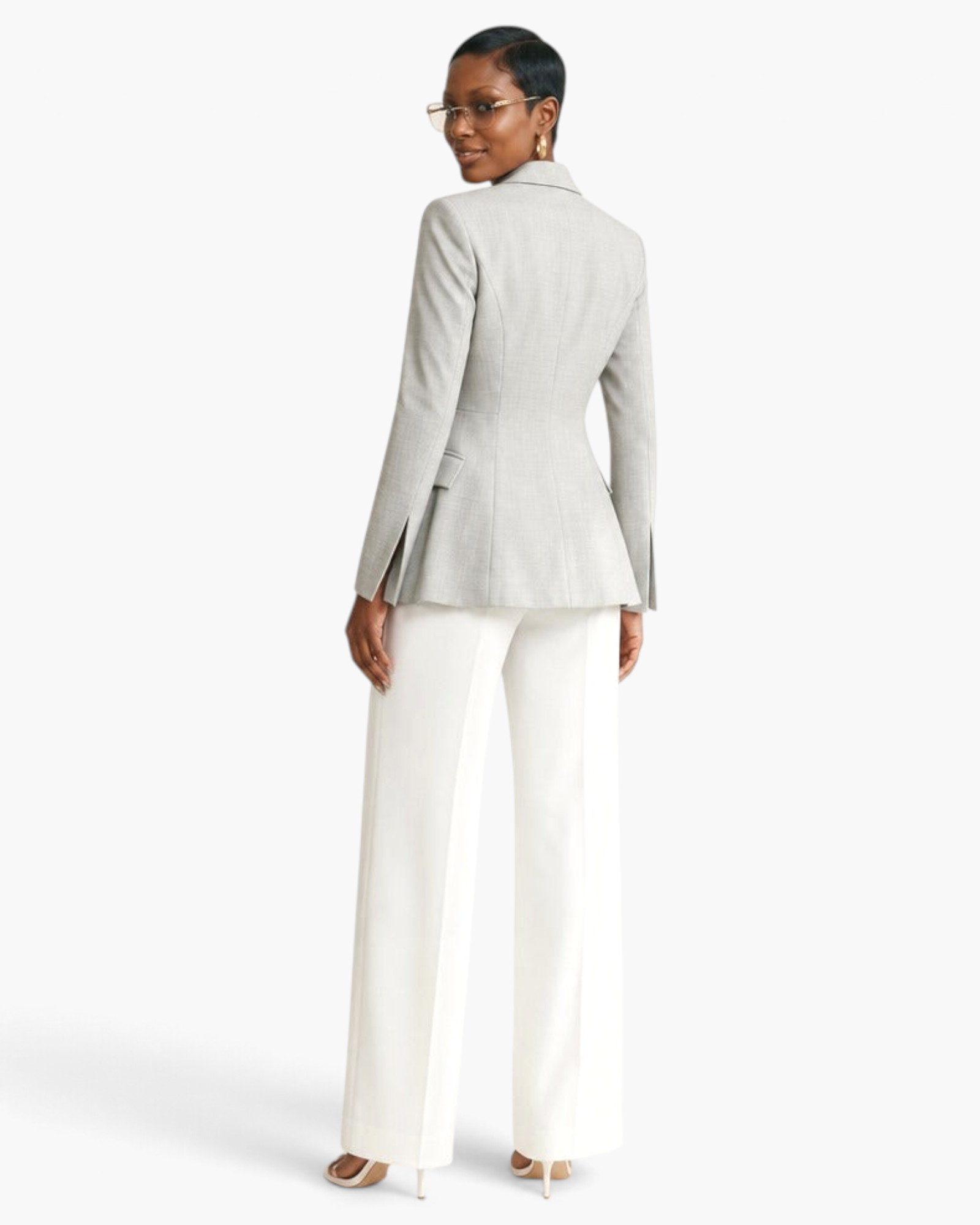 Beach Rose Co. light gray asymmetrical blazer with tailored waist and sleeve vents worn by a model from behind