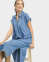 Beach Rose Co. light wash denim midi dress with collared neckline, short sleeves, side pockets, and frayed hem.