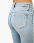Beach Rose Co. light wash mid-rise flare jeans featuring classic 5-pocket construction and a back view